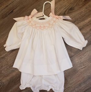 Bow peep smocked dress and bloomers.